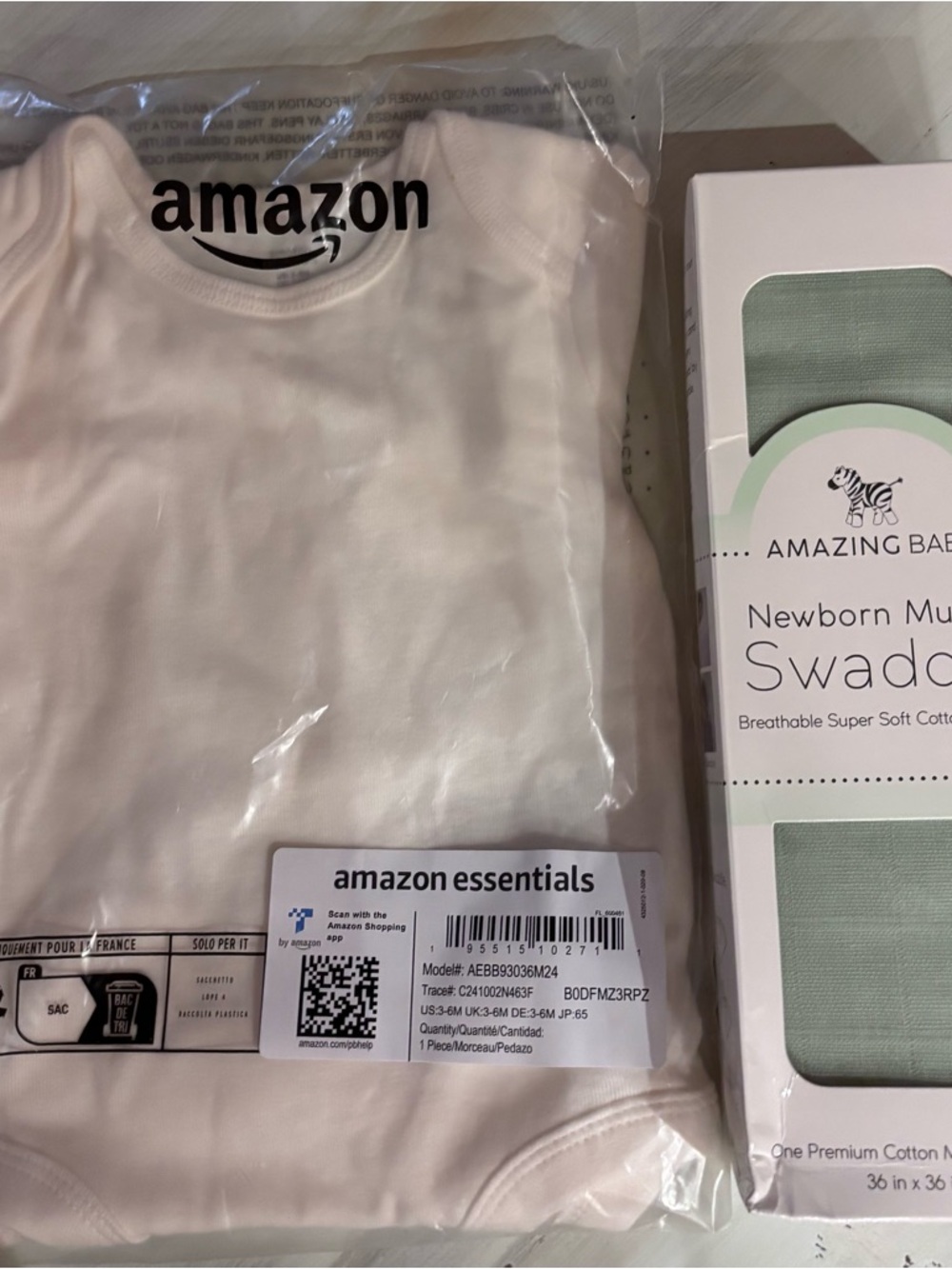 NWT Amazon Essentials Onesie 3-6 months & Amazing Baby Newborn Muslin Swaddle